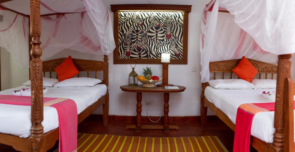 Mangro Hotel Playa de Diani Habitación foto